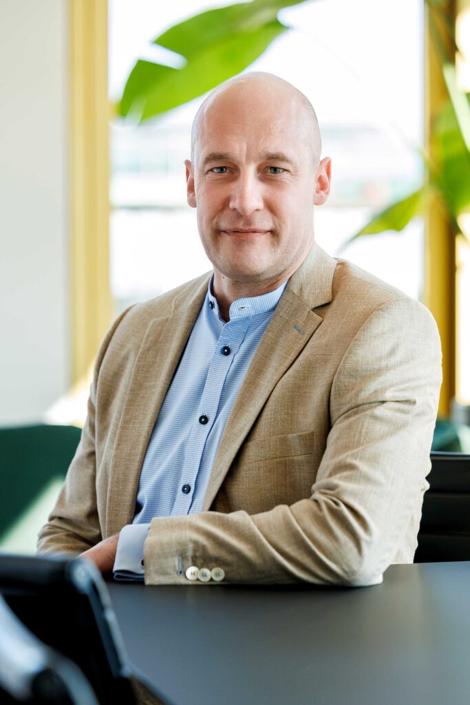 Markus Eschner, CFO bei VALUES, lächelt in die Kamera