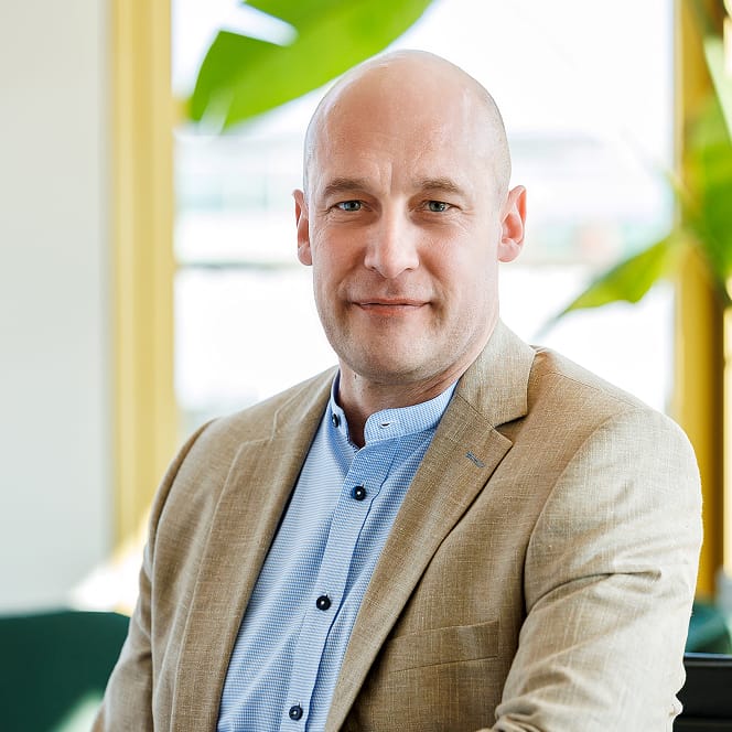 Markus Eschner, CFO bei VALUES, lächelt in die Kamera